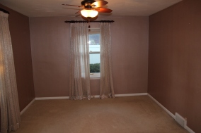The master bedroom, which has sort of a pearlized mauve paint right now. Every room is getting new paint.